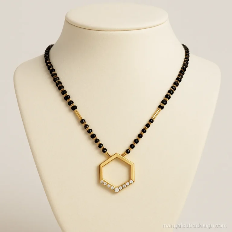 Modern 10 gram gold mangalsutra with an open hexagon pendant edged in small diamonds