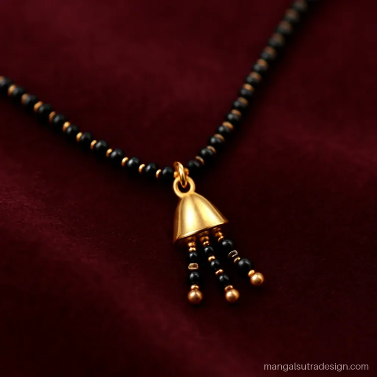 5 gram gold mangalsutra with a small gold cap and three black bead tassels