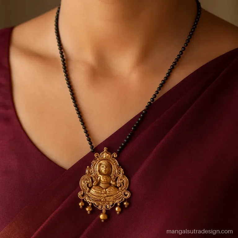 Mangalsutra gold plated in a long temple style with a carved pendant
