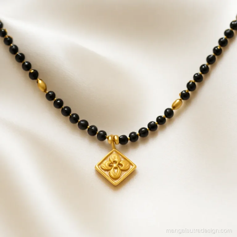 Black mani mangalsutra with gold rice beads placed between every few black beads