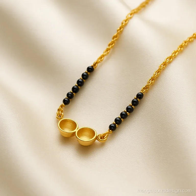 Gold mangalsutra chain with a Singapore twist chain and a mini double vati pendant