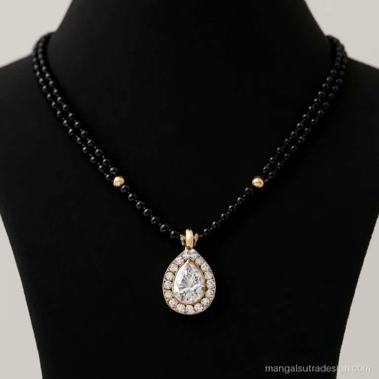 Diamond mangalsutra pendant with a pear solitaire and a halo of tiny diamonds