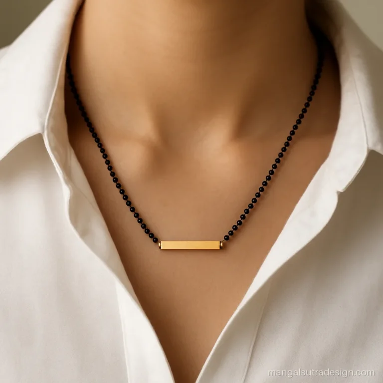 Short latest mangalsutra design with a horizontal gold bar pendant on black beads