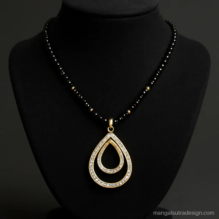 Mangalsutra latest design with two stacked teardrops outlined in tiny white stones