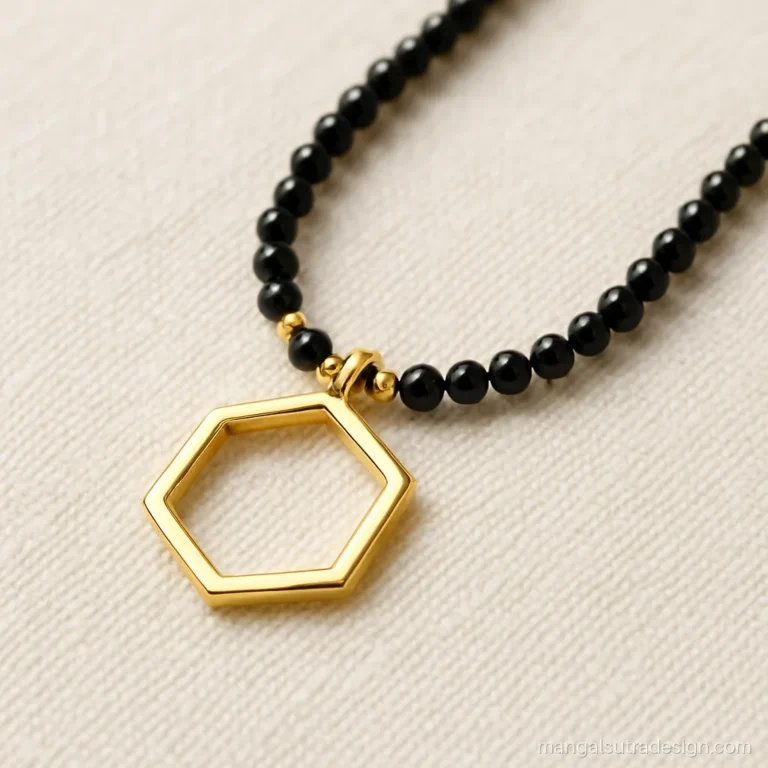 Modern mangalsutra design with an open hexagon pendant in yellow gold on black beads