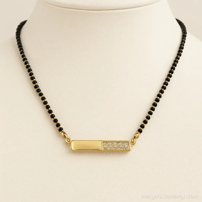 Modern gold mangalsutra design with a horizontal bar set with a half row of small diamonds