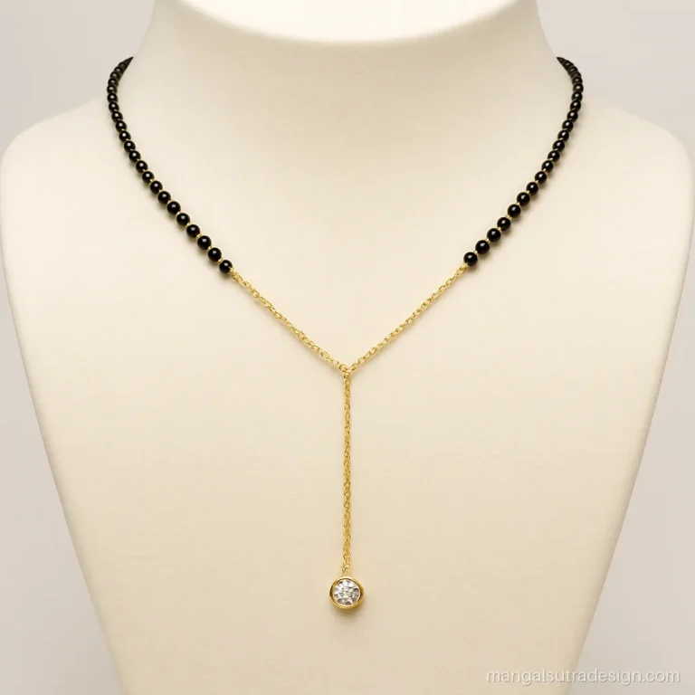 Modern mangalsutra with a layered Y drop chain ending in a small diamond