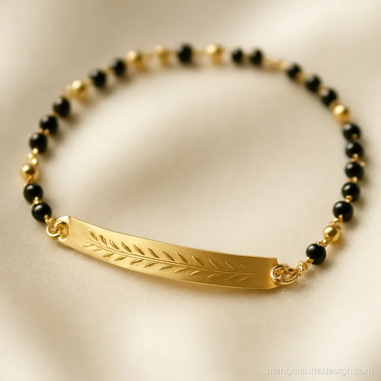 Hand mangalsutra in gold with a flat engraved bar and black bead links