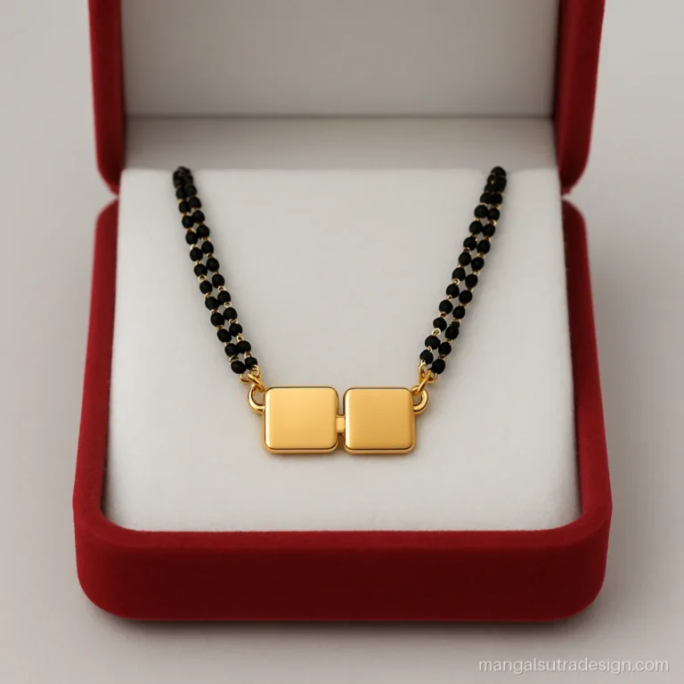 Couple name mangalsutra with two small blank gold plates linked by a tiny ring