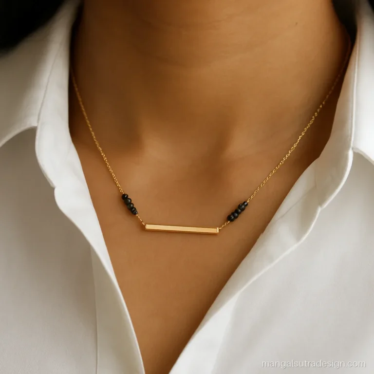 Light weight gold mangalsutra design with a slim horizontal bar on a fine chain