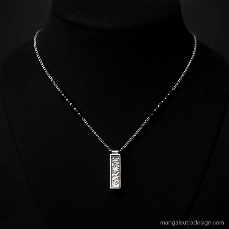 White gold mangalsutra with a vertical line of baguette diamonds