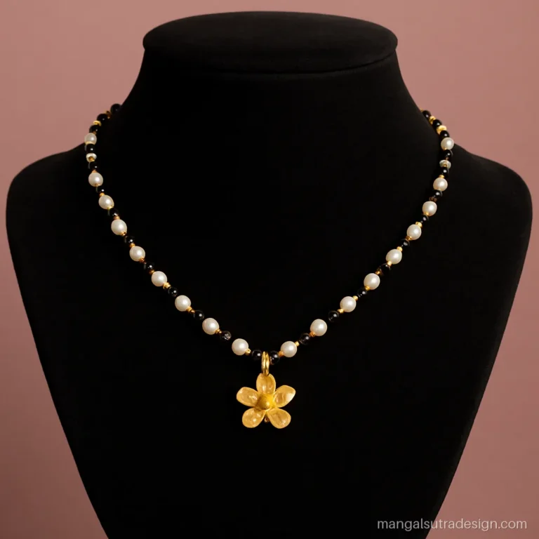 Choker mangalsutra with alternating pearls and black beads and a small gold flower centre