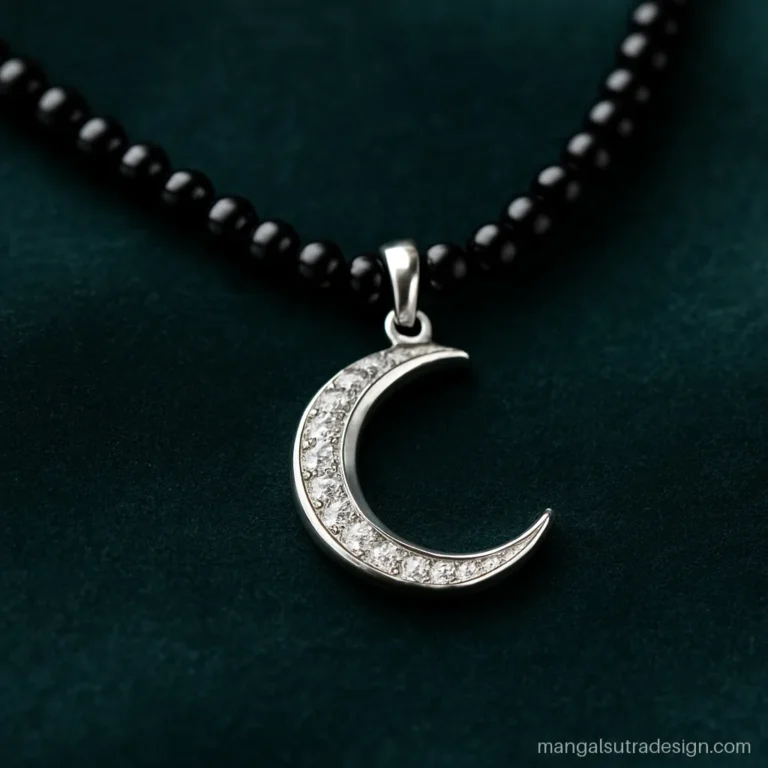 Silver short mangalsutra design with a crescent pendant lined with tiny white stones