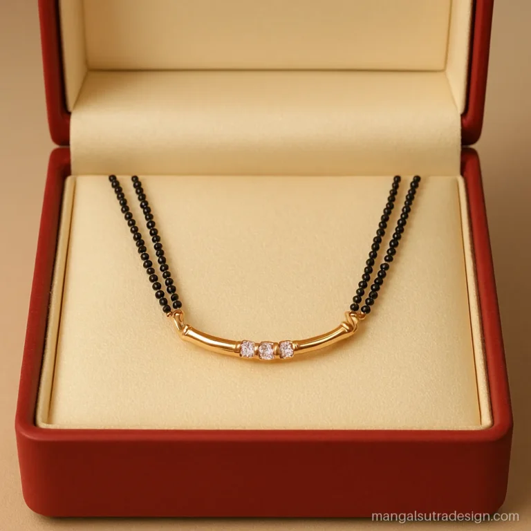 Small mangalsutra design with three diamonds on a curved rose gold bar