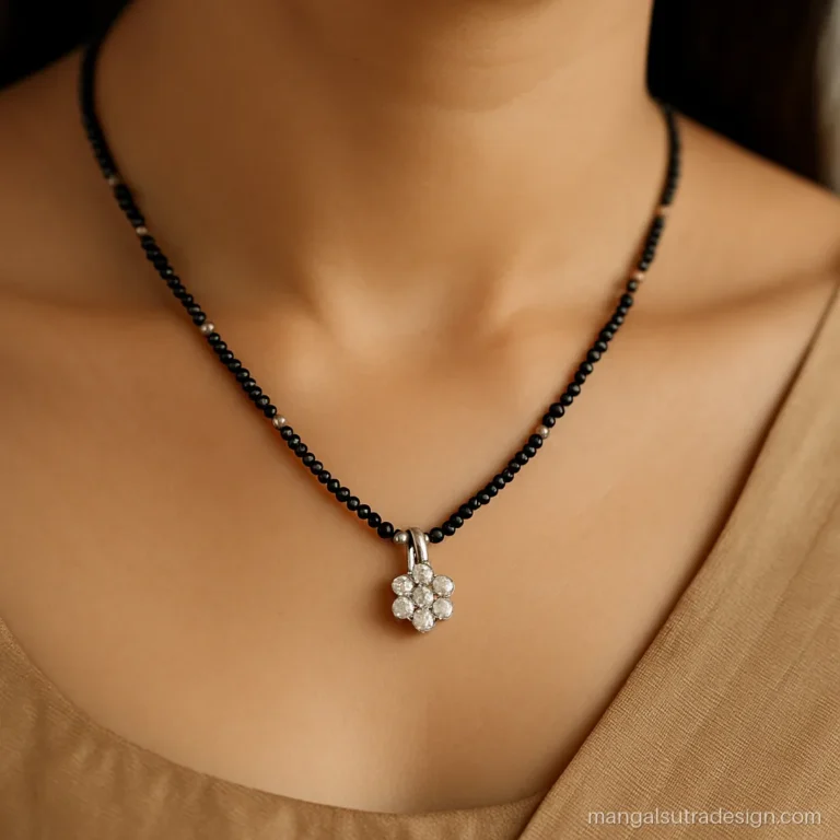 Small white gold mangalsutra design with a seven diamond flower cluster